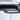 Detailed shot of matte carbon fiber finish on Tesla Model Y Juniper taillight overlay
