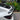 Side view of Tesla Model Y with V-style carbon fiber spoiler installed