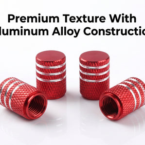 Set of red aluminum valve stem caps with knurled texture
