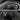 close up of Tesla Model Y Juniper Real Carbon Fiber Rear Cup Holder Cover