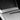 Close-up of Plian weave Carbon Fiber Wireless Charging Pad Frame Overlay installed on Tesla Model 3 Highland