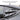 Glossy carbon fiber style louvers installed on Tesla Model Y rear side window