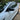 Outdoor photo of a Real Carbon Fiber Mirror Covers installed on a Tesla Model 3 Highland 2024+