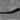 Close-up view of real carbon fiber texture on Tesla Model 3 Highland console side panel cover