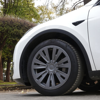 Matte gun gray wheel cover on a car wheel, multi-spoke design