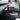 Side view of Red glossy Carbon Fiber Turn Signal Stalk Covers installed on Tesla Model Y Juniper