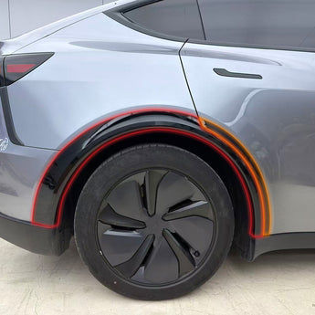 Highlighted rear wheel arch trim installation area on a silver Tesla Model Y Juniper