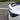 Close-up of real red carbon fiber weave on Model Y Juniper spoiler