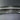 Close up view of real carbon fiber weave on 2024 Tesla Model 3 rear spoiler