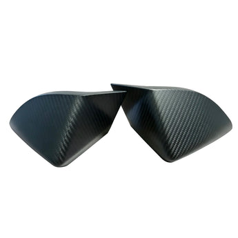 Tesla Model Y real carbon fiber front bumper fog light trim installed close-up