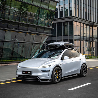 Tesla Model Y Juniper with Dragon Flame Pro front lip and side skirts in front three-quarter view