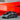 Tesla Model Y Juniper Dragon Flame Pro aero body kit shown from the front three-quarter view