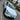 Tesla Model Y Juniper front bumper trim showing precision-molded edges and glossy finish