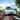 Front driving view of Tesla Model Y Juniper with Dragon Flame Pro front lip and full aero body kit