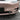 Tesla Model Y with tiger tooth style real carbon fiber fog light trim front view