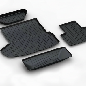 All-weather floor mat set with multiple dark ridged liners for front and trunk areas