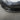 Close-up of Real Carbon Fiber Aero Front Lip Spoiler installed on 2024+ Tesla Model 3 Premium