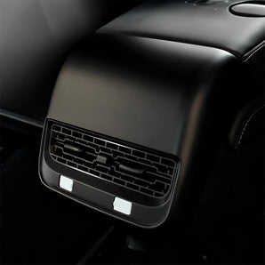 Car interior rear vent area with black ABS outlet cover installed