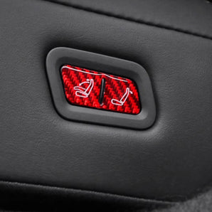 Carbon Fiber Rear Seat Folding Button Trim installed on Tesla Model Y Juniper 