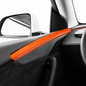 Orange Alcantara door panel trim insert with red ambient accent line along the door panel.