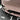 Tesla Model Y carbon fiber fog light trim installed on front bumper side view