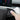 Tesla digital instrument cluster showing tire pressure readings, speed and vehicle status