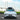 Front view of Tesla Model Y Juniper with Dragon Flame Pro front aero body kit installed