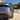 Rear three-quarter view of Tesla Model Y Juniper with black ABS wheel arch trim installed