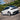 White Tesla Model Y Juniper fitted with REV front lip and side skirt kit