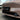 Tesla Model Y real carbon fiber fog light trim pair in tiger tooth style