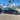 Side view of Tesla Model Y Standard fitted with 18-inch turbine-style wheel covers